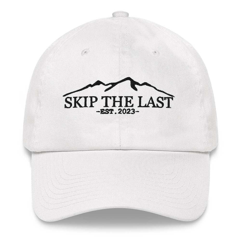Two More Skip The Last "Skip the Last" white unisex embroidered dad hat. Front view