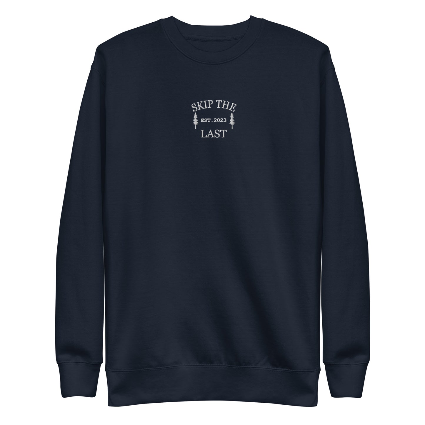 Two More Skip The Last "Skip The Last Pine Tree" navy unisex embroidered crewneck. Front view