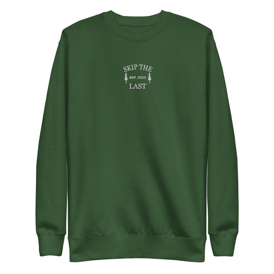 Two More Skip The Last "Skip The Last Pine Tree" forest green unisex embroidered crewneck. Front view
