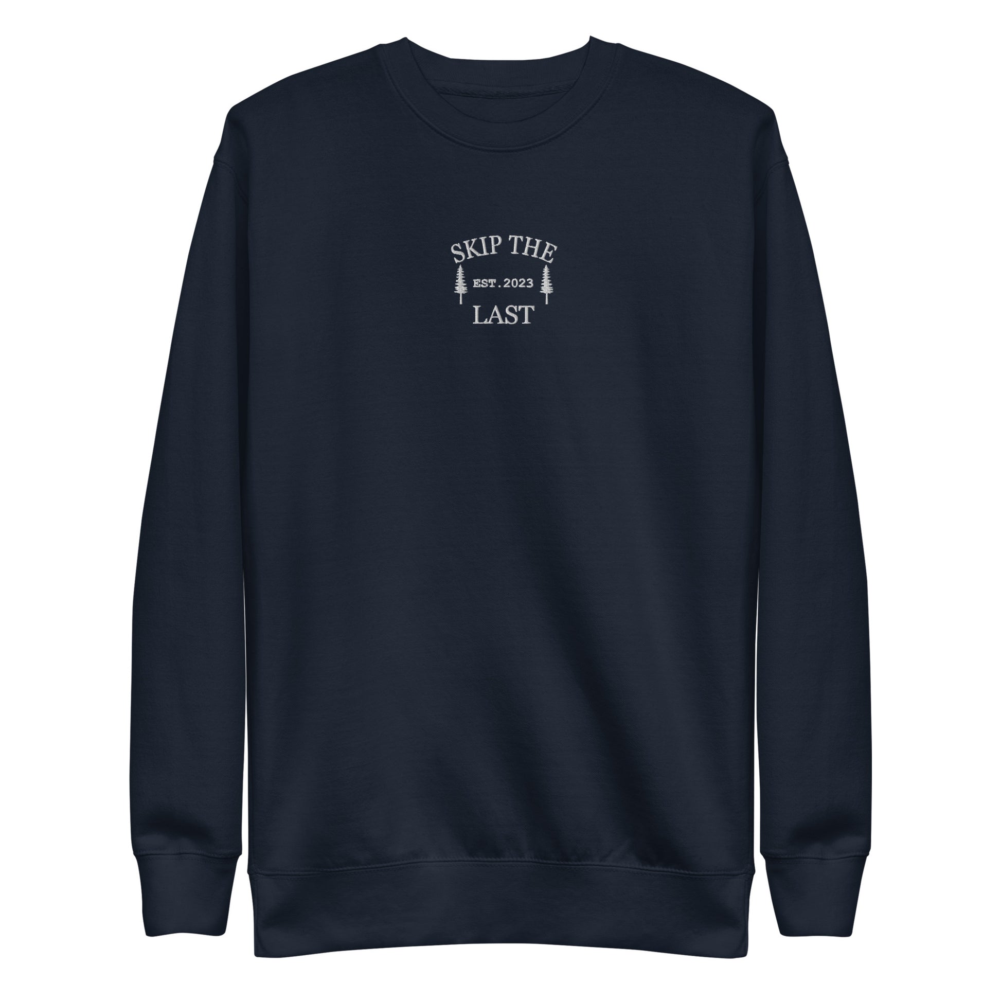Two More Skip The Last "Skip The Last Pine Tree" navy unisex embroidered crewneck. Front view