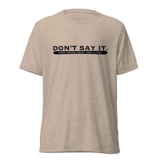 Two More Skip The Last "Don't Say It" tan unisex tri-blend short sleeve t-shirt. Front view